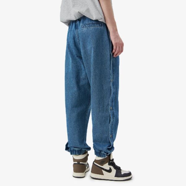 jean tendance avec boutons métallisés